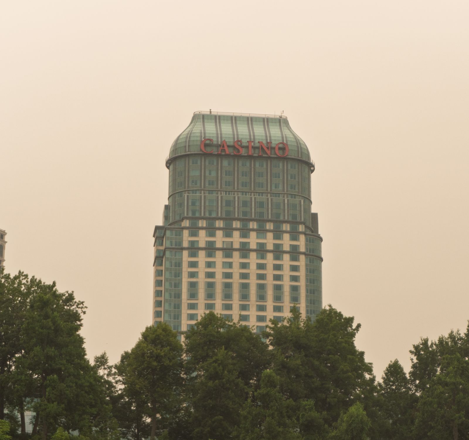 The Fallsview casino tower in haze